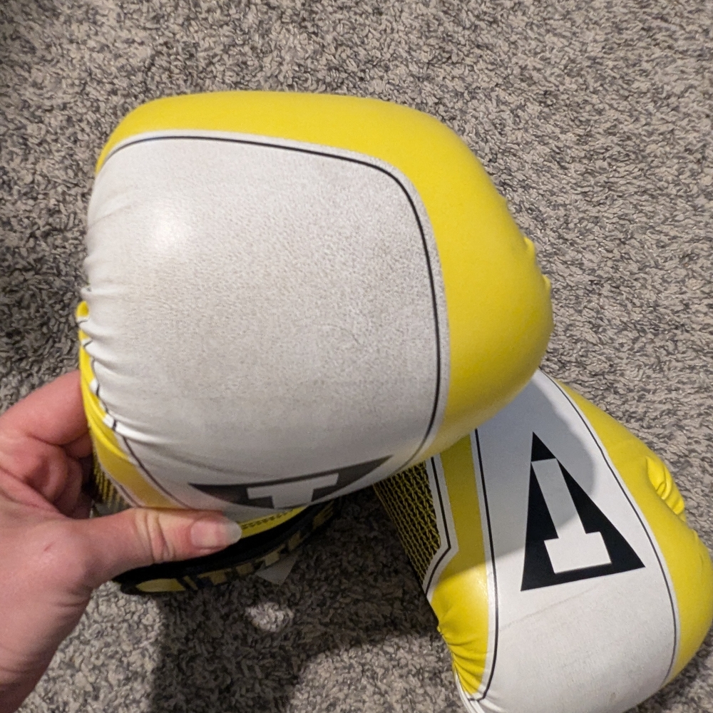 Title Yellow and White Boxing Gloves